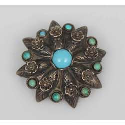 Silver brooch with turquoise