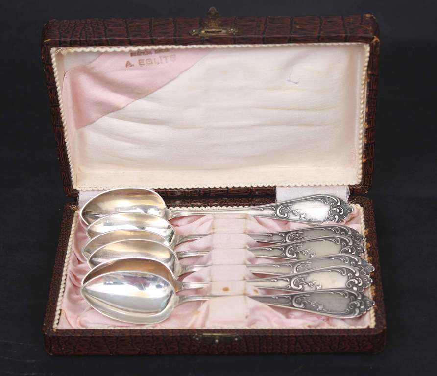 Six silver teaspoons