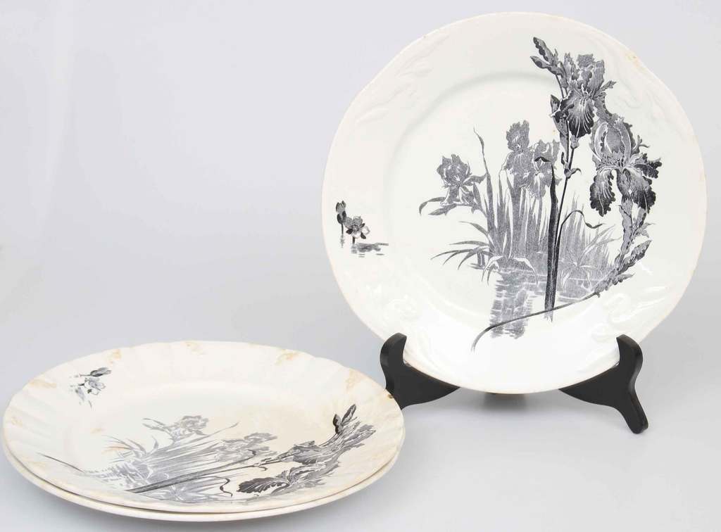 Three painted earthenware plates