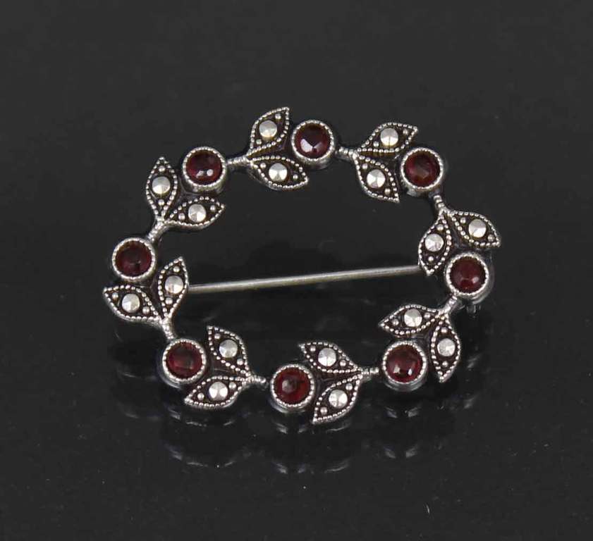 Silver brooch with garnets ? and marcasite crystals