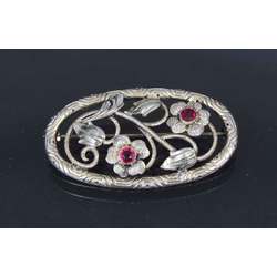 Silver Art Nouveau gilded brooch with rubies