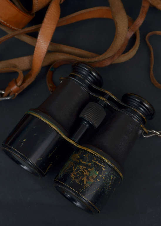 Binoculars in a leather case 