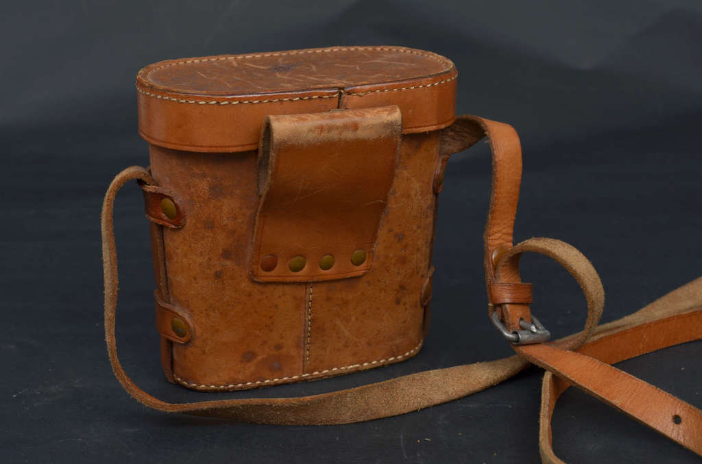 Binoculars in a leather case 