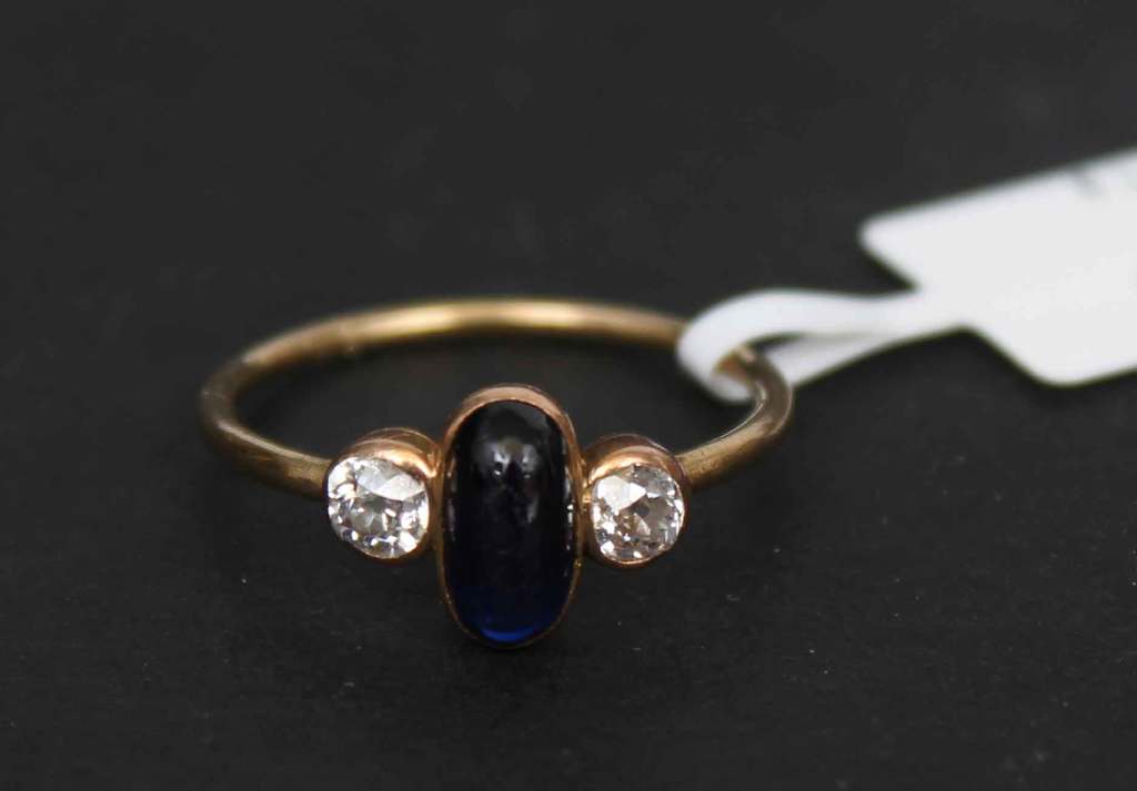 Gold ring with sapphire and two diamonds