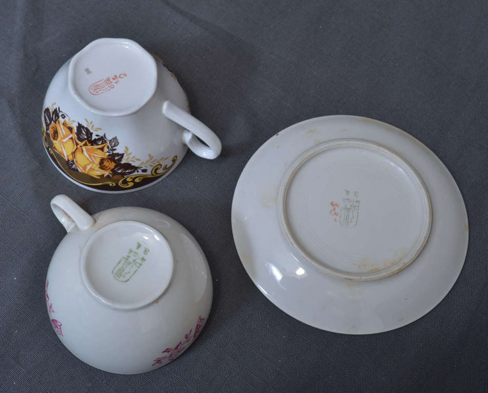 Porcelain cup with saucer and mug
