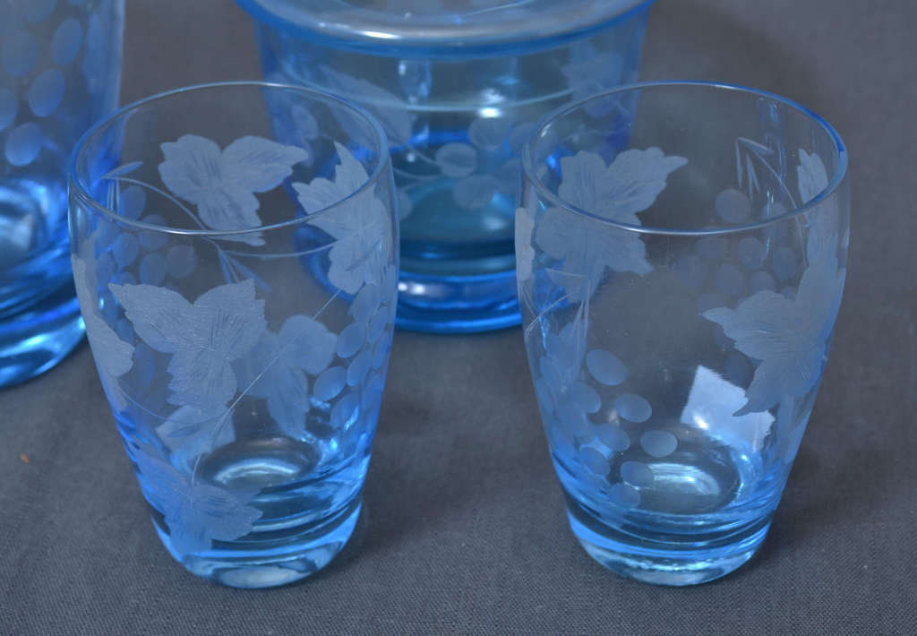 Blue glass mug with lid, glass and sugar bowl