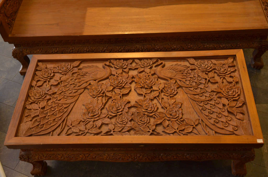 Mahogany table and chairs with wood carvings