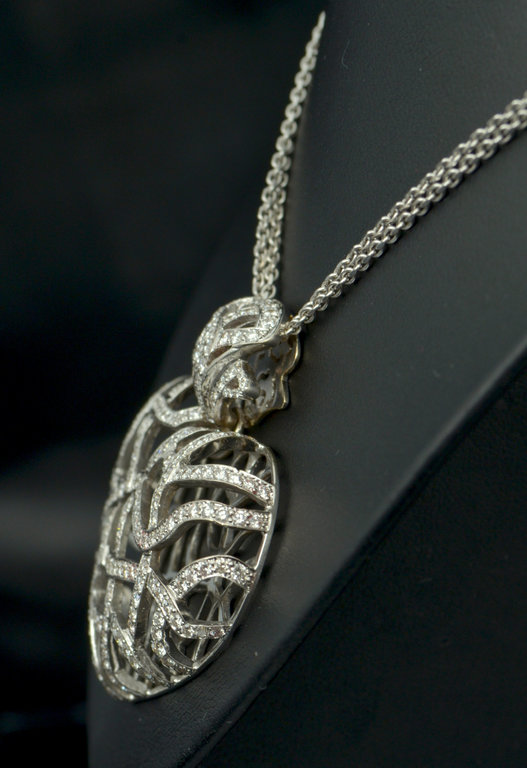 White gold necklace with diamonds and heart-shaped pendant