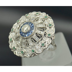 White gold ring with 43 diamonds, 14 sapphires and 12 emeralds