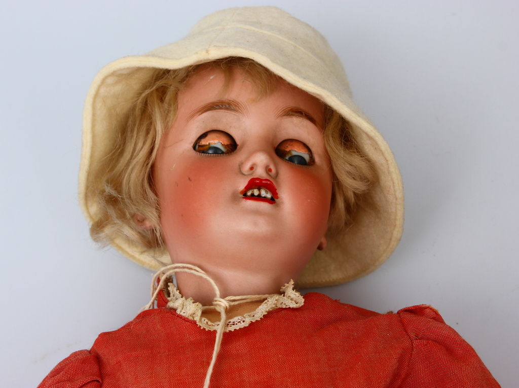 Doll with a porcelain head