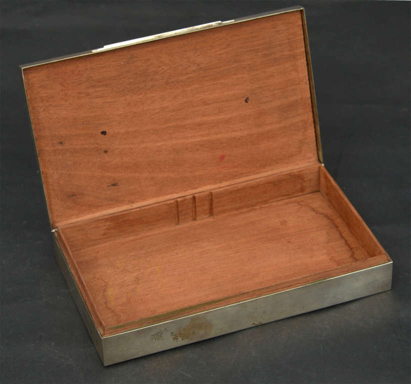 Silver chest with wooden finish on the inside