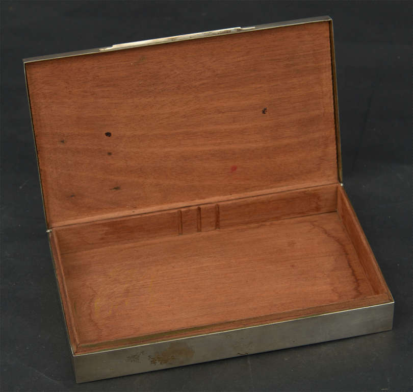 Silver chest with wooden finish on the inside
