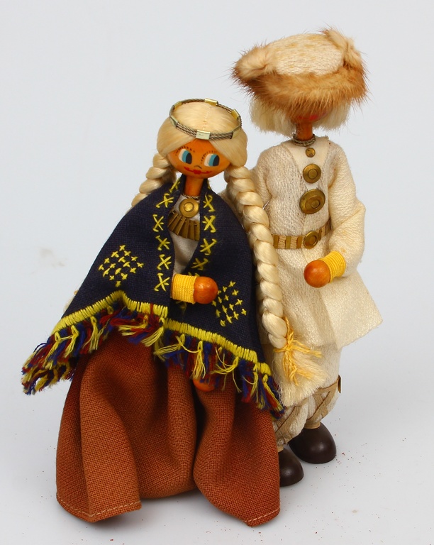Two wooden dolls