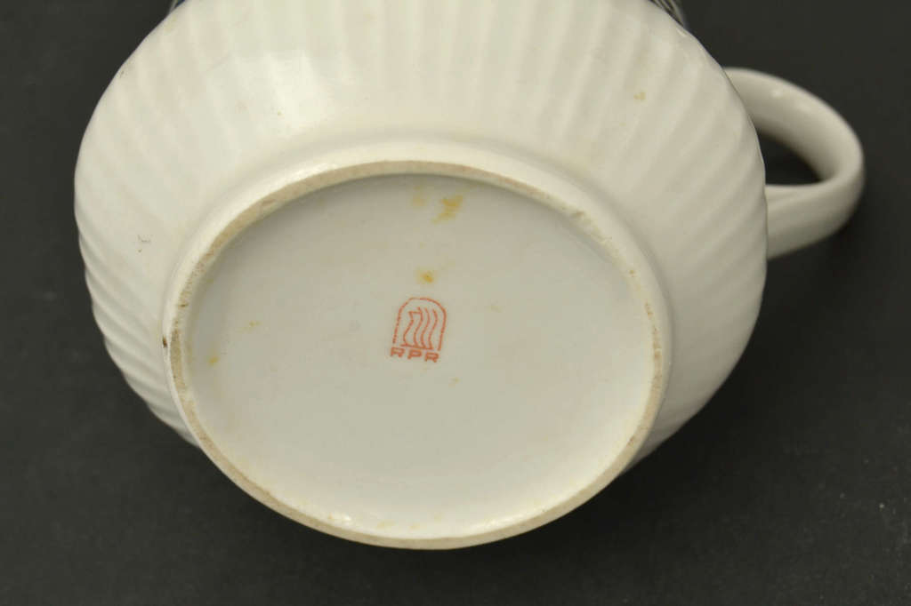 Porcelain teapot and creampot