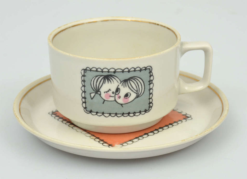 Porcelain children's plate and cup with saucer