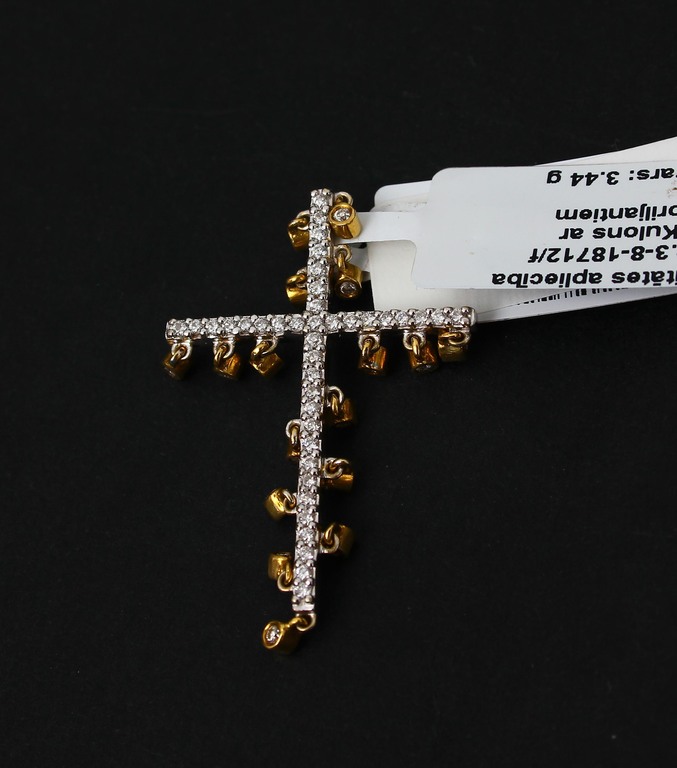 Gold cross with brillants