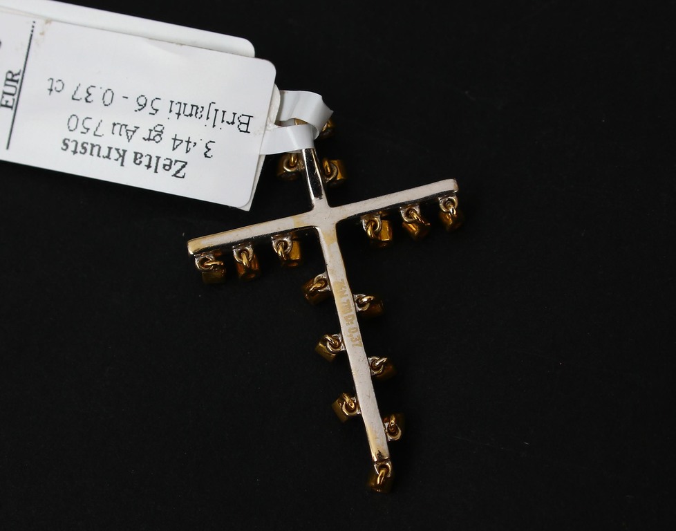 Gold cross with brillants