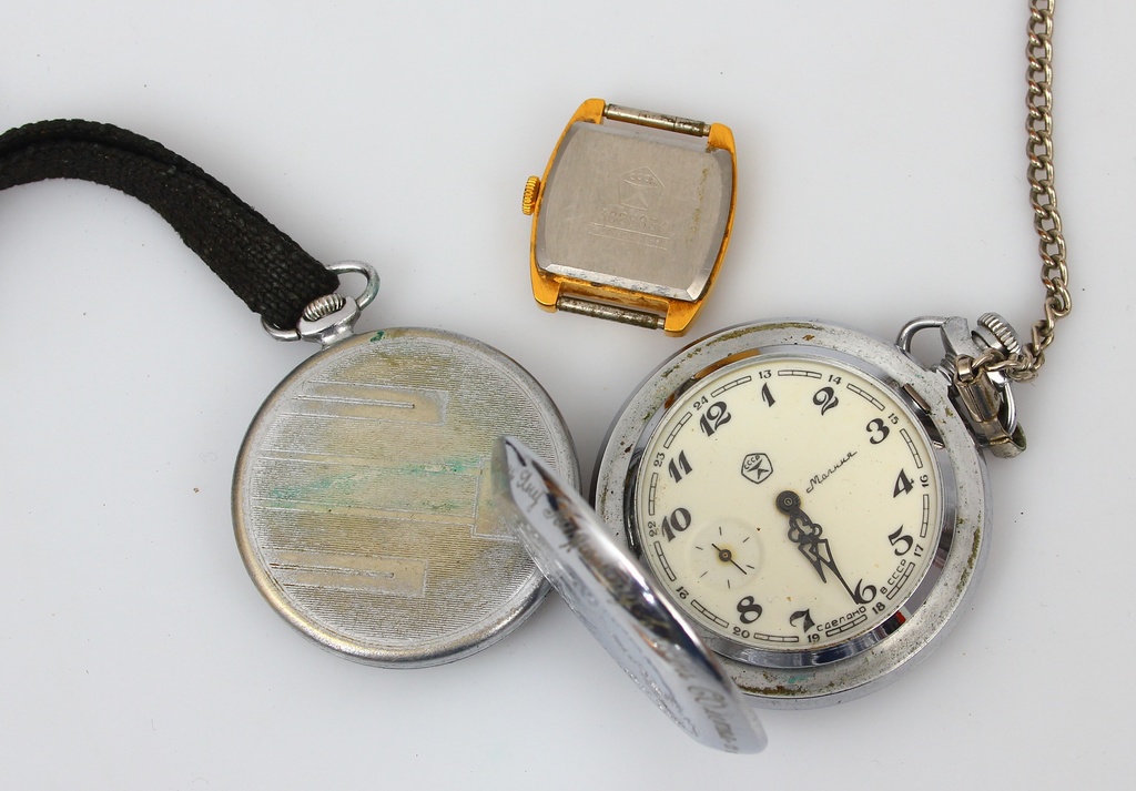 Two clocks and a stopwatch