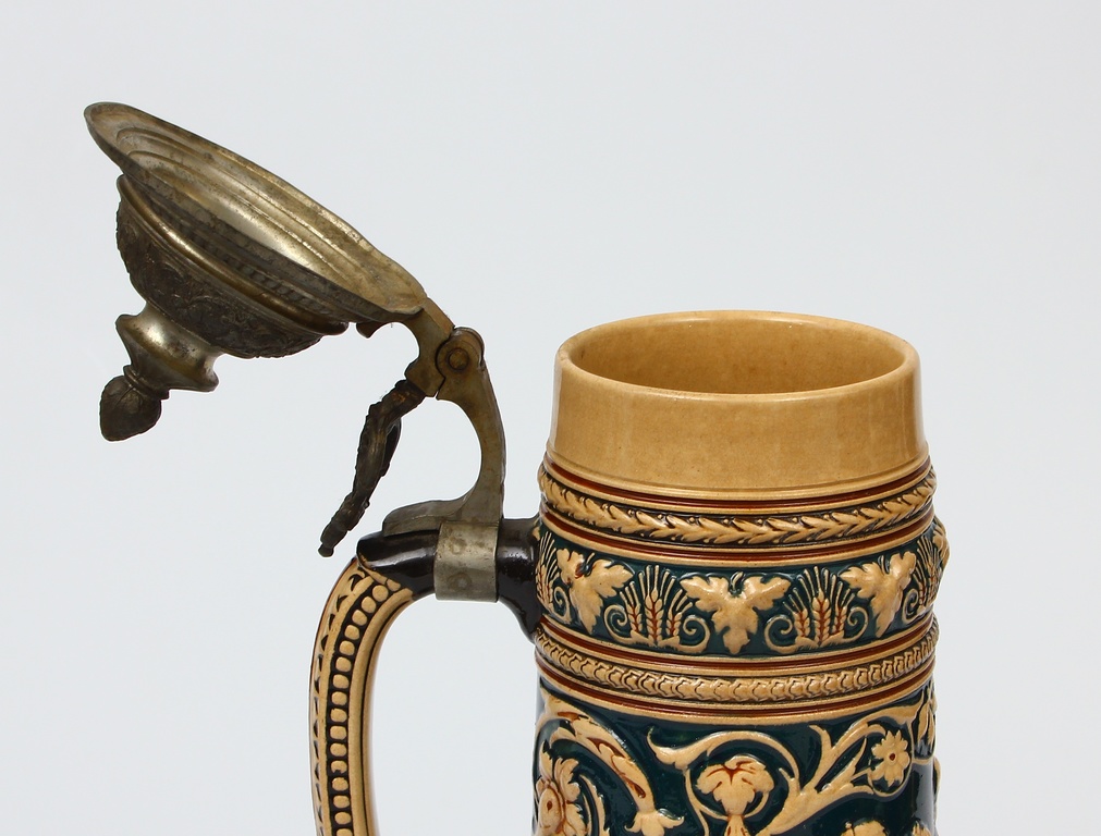 Faience beer cup with metal lid