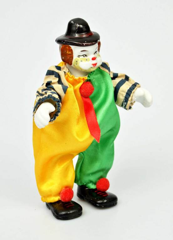 Porcelain doll clown with flexible legs and arms