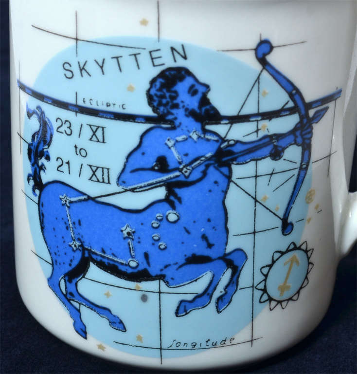 Porcelain mug with a zodiac theme
