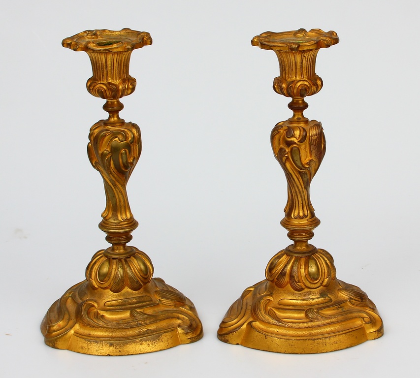 A pair of gilded bronze candlesticks