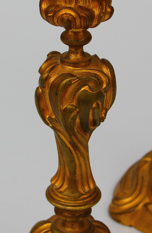 A pair of gilded bronze candlesticks