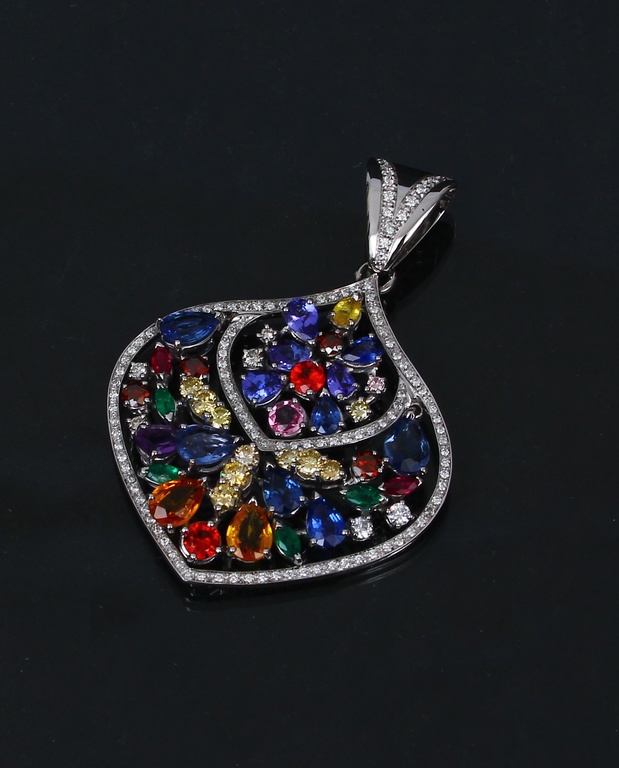 White gold pendant with precious stones