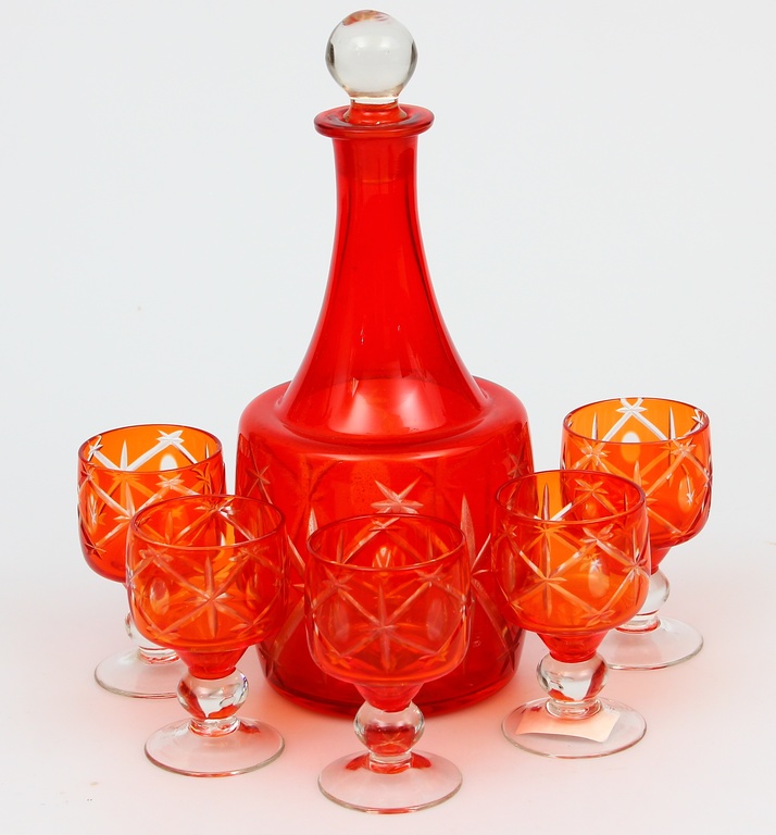 Red glass decanter with five glasses