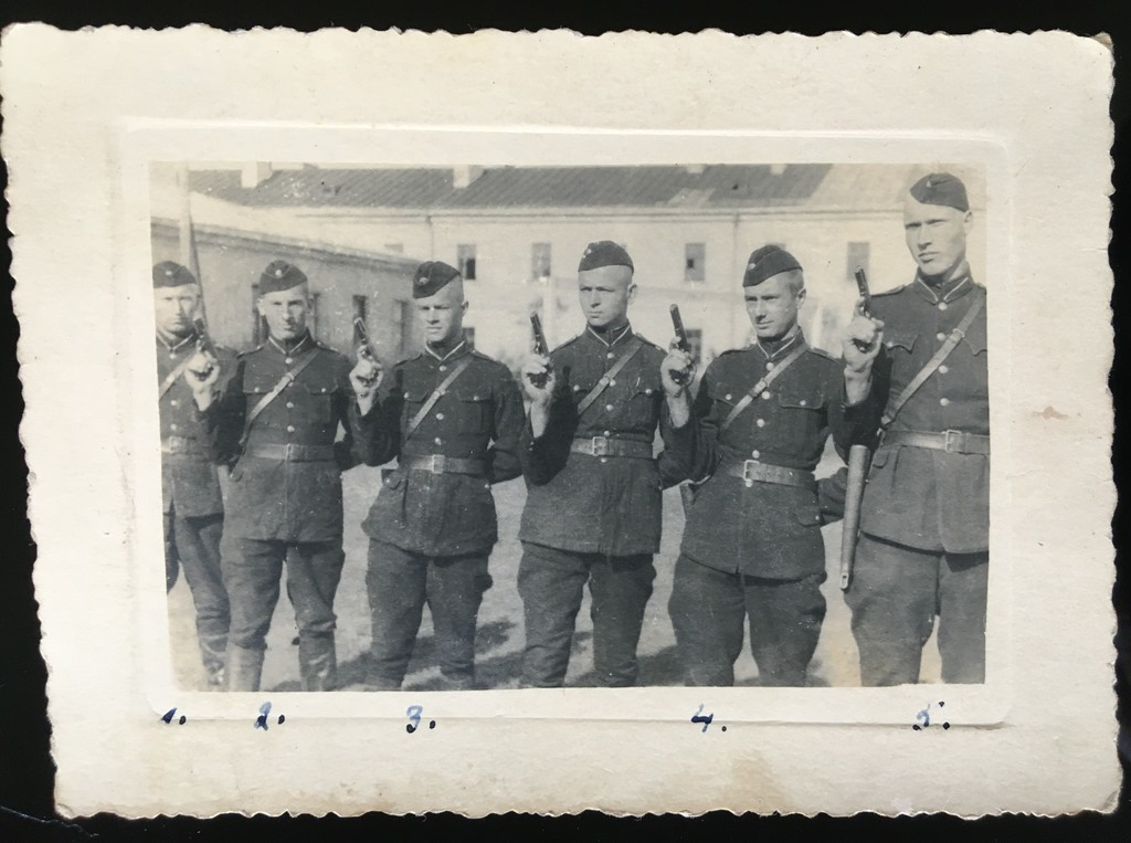 Latvian army officers with pistols 