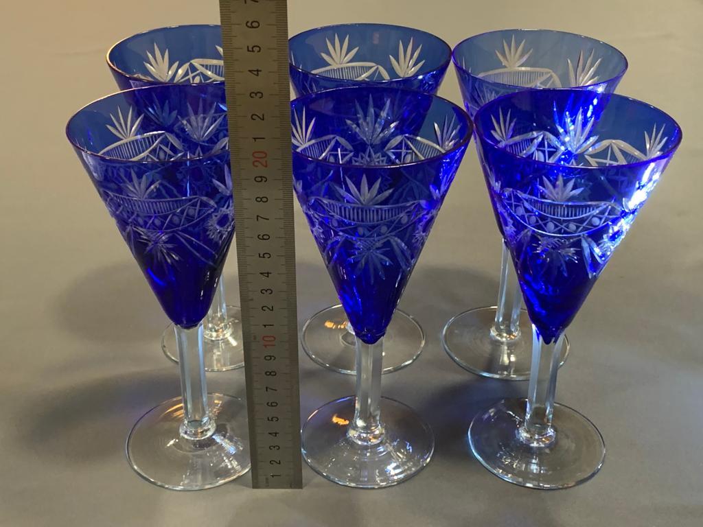 Six large blue glasses