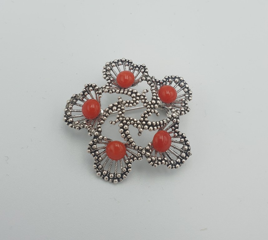 Silver Art Nouveau brooch with red coral