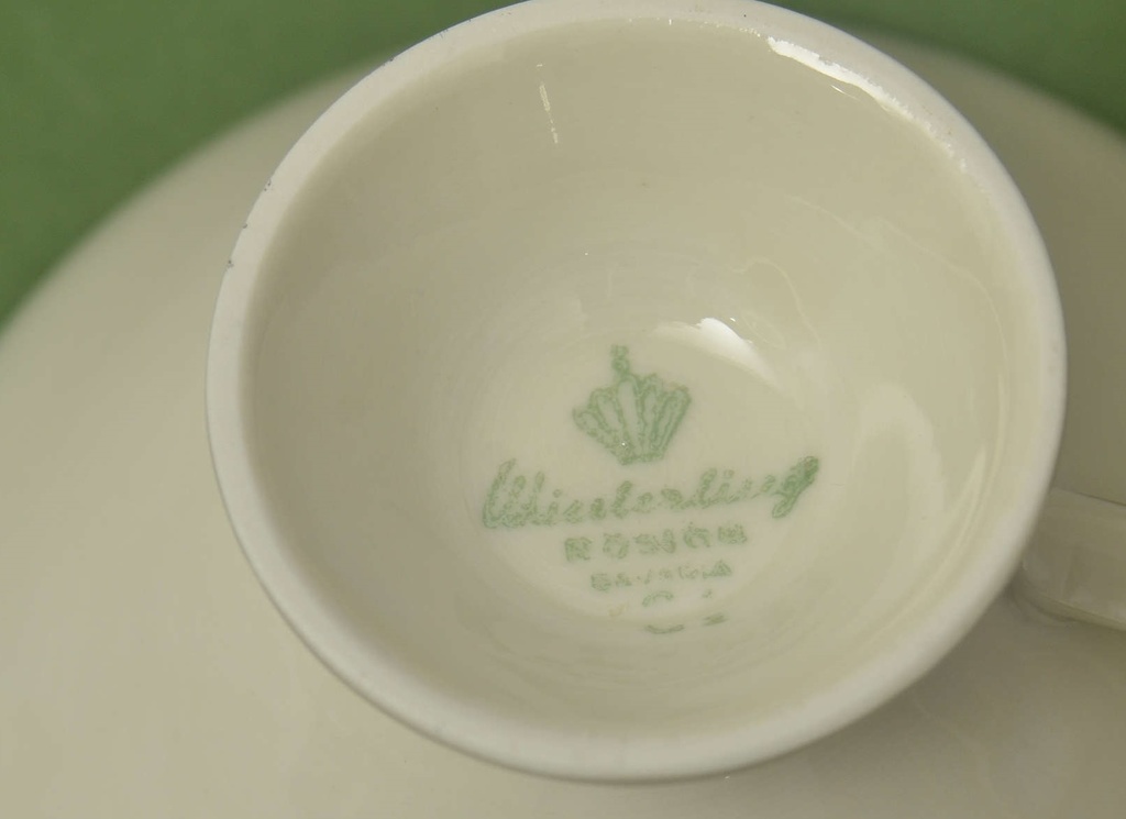 Porcelain cup with 2 saucers