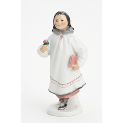 Figure. Nanai (Yakut) with a flower (first day of school)