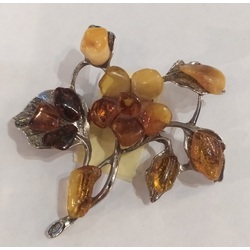 Amber brooch with metal finish - Flowers