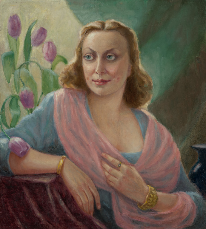 A woman by the purple tulips