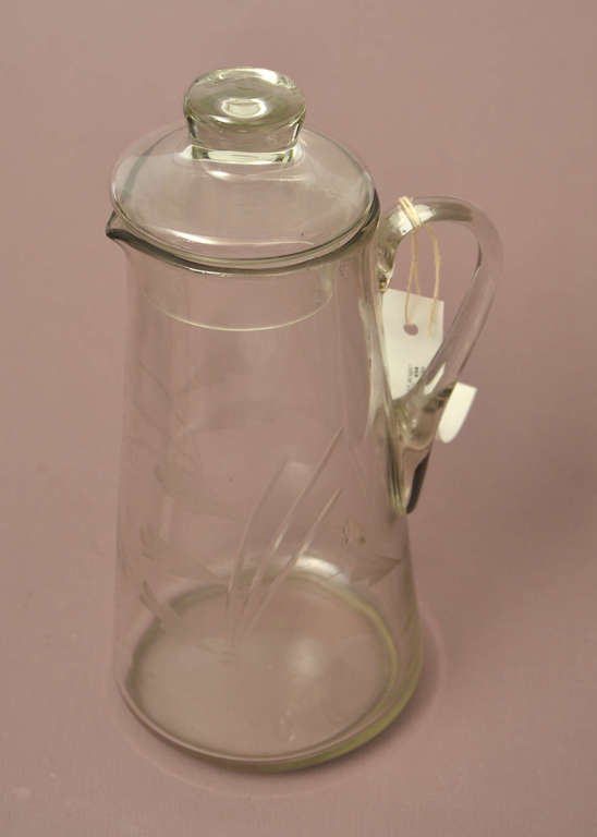Glass juice jug with a lid