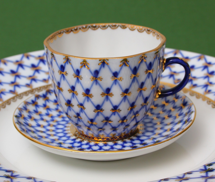 Porcelain cup with saucer and plate 