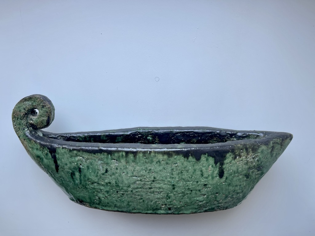 Vase in the shape of a boat .Ceramic