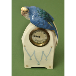 Faience clock with a parrot