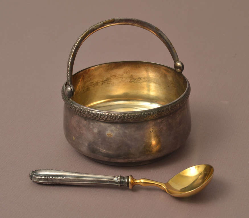 Silver sugar bowl with spoon