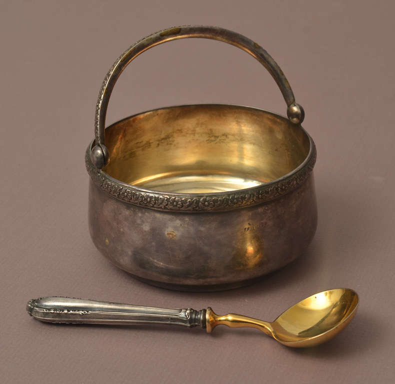 Silver sugar bowl with spoon