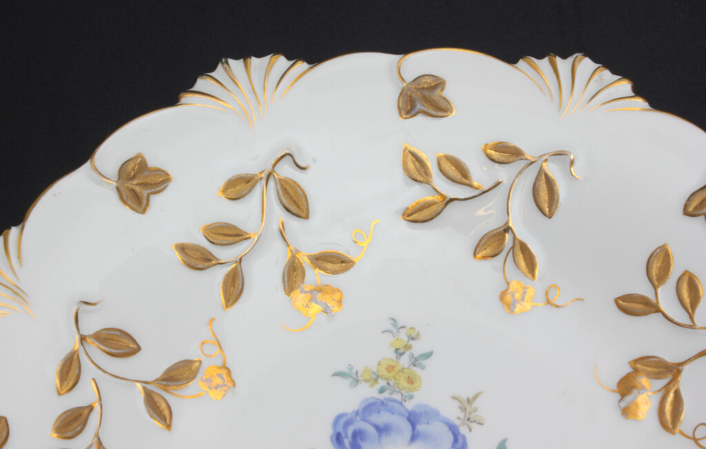 Decorative porcelain plate with gilding