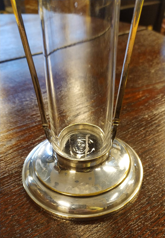 Art Nouveau glass vase with a metal frame