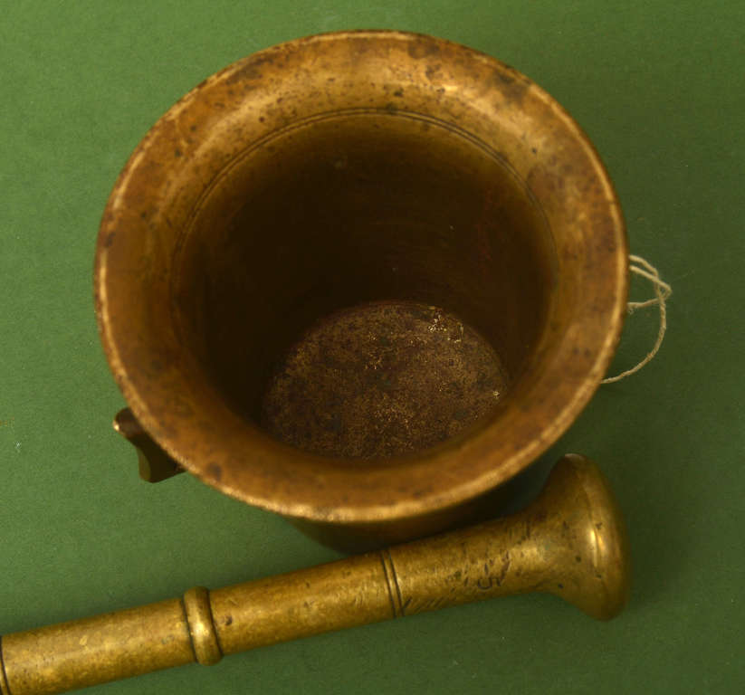 Bronze pestle with a pier