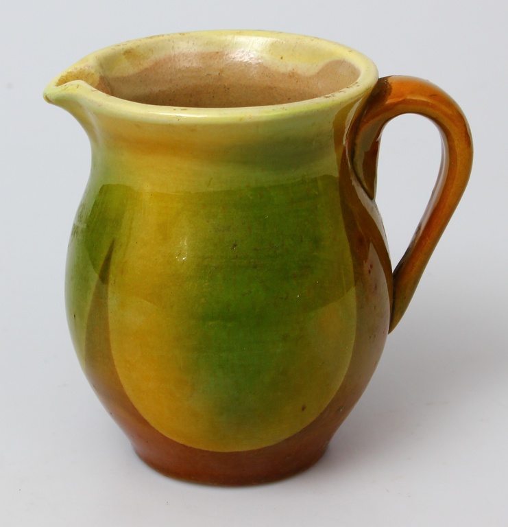 Ceramic milk mug with ornament