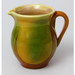 Ceramic milk mug with ornament