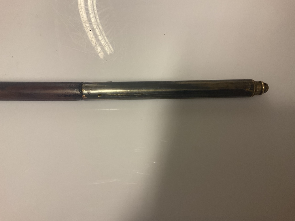 Mahogany cane with silver finish