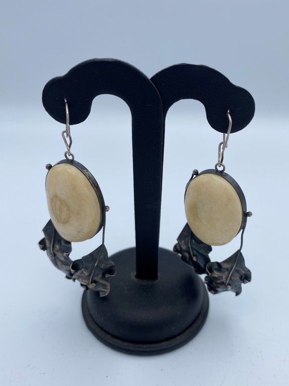 Silver earrings with bone
