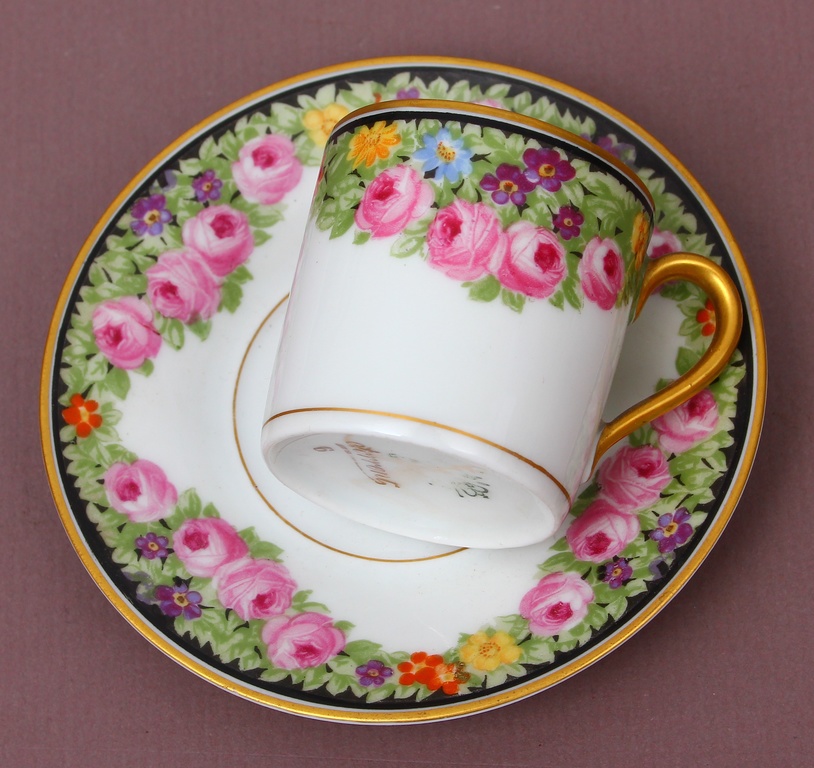 Coffee cup with saucer